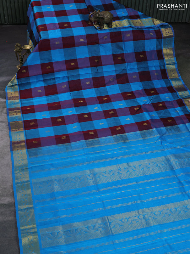 Silk cotton saree maroon and cs blue with allover paalum pazhamum checks & buttas and zari woven border