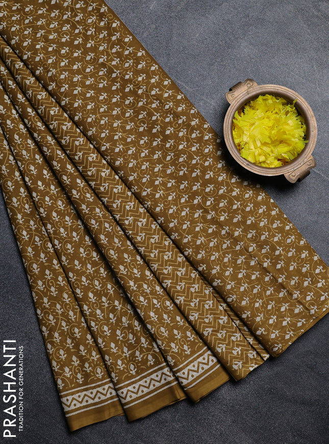 Jaipur cotton saree mehendi green with allover dabu prints and printed border