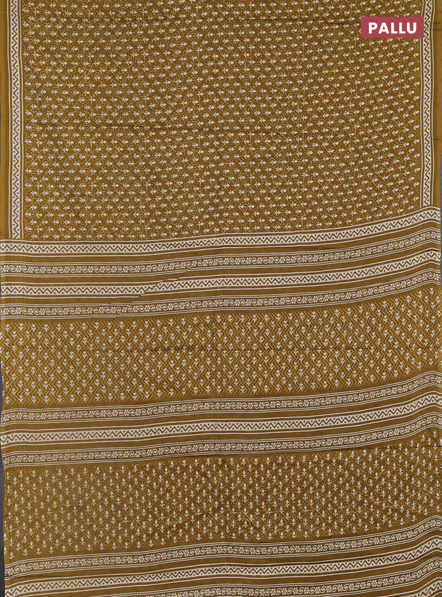 Jaipur cotton saree mehendi green with allover dabu prints and printed border