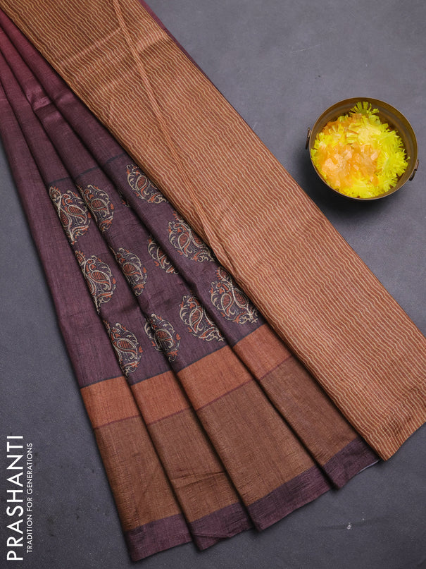 Semi tussar saree maroon and brown with plain body and embroidered pallu