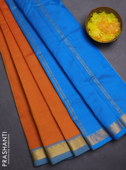 Silk cotton saree orange and cs blue with plain body and zari woven border