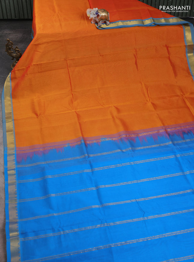 Silk cotton saree orange and cs blue with plain body and zari woven border