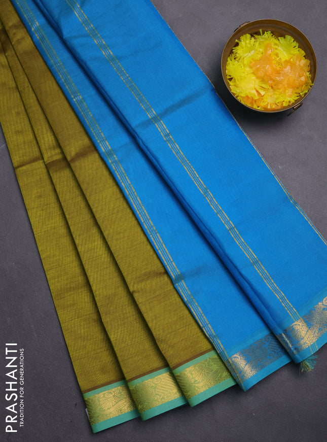 Silk cotton saree mehendi green and cs blue with plain body and zari woven border
