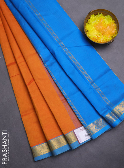 Silk cotton saree orange and cs blue with plain body and zari woven border