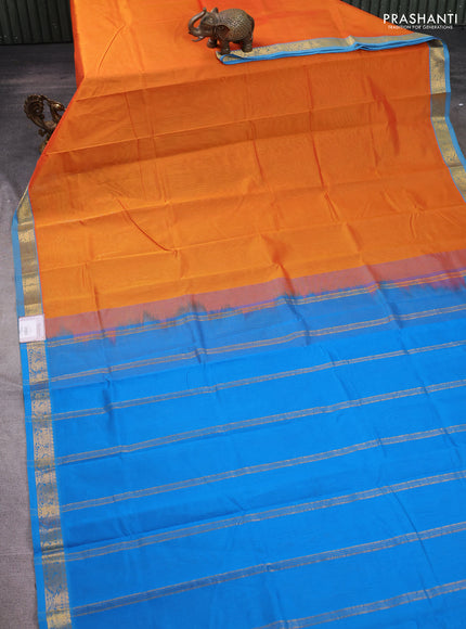 Silk cotton saree orange and cs blue with plain body and zari woven border