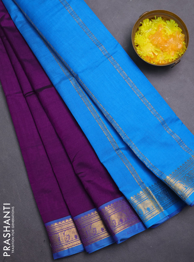 Silk cotton saree violet and cs blue with plain body and zari woven border