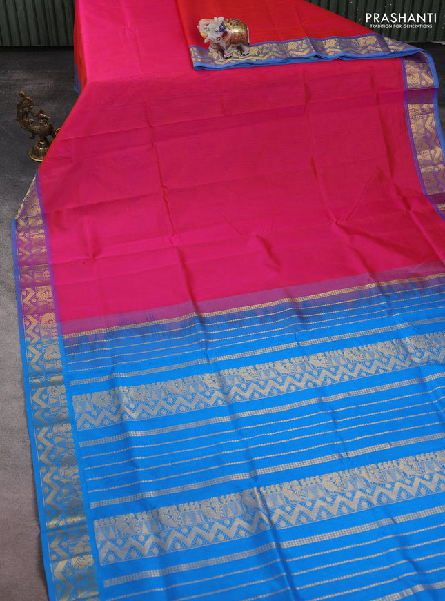 Silk cotton saree pink and cs blue with plain body and zari woven border