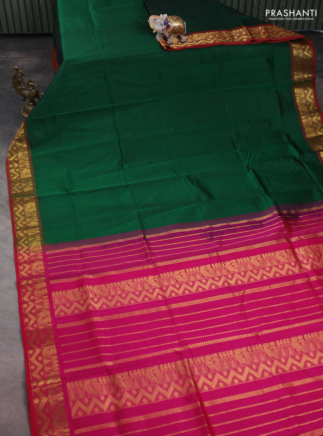 Silk cotton saree green and pink with plain body and zari woven border