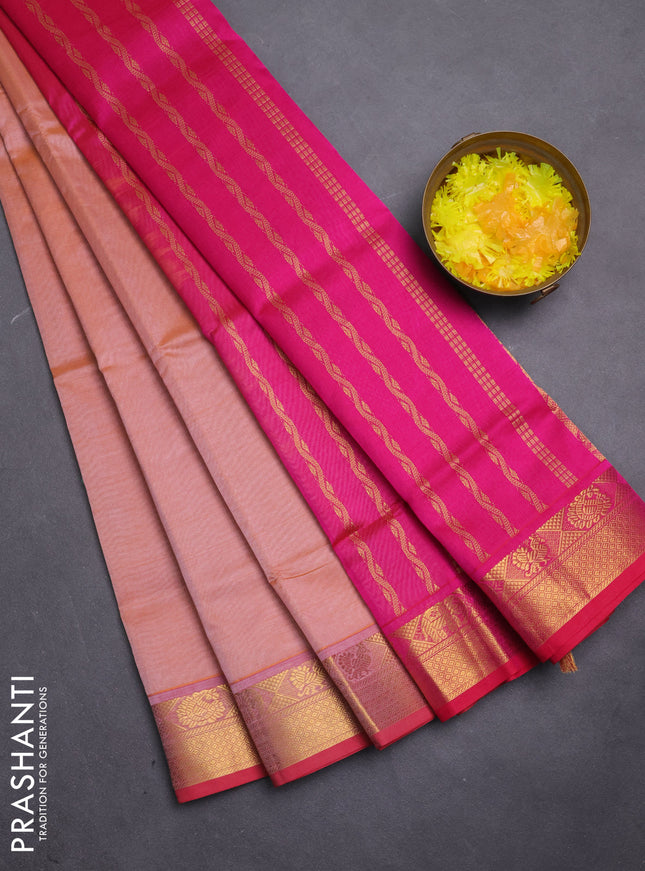 Silk cotton saree dual shade of peach orange and pink with plain body and zari woven border