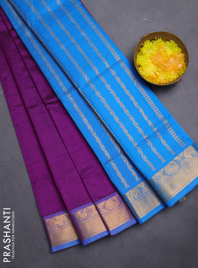 Silk cotton saree purple and cs blue with plain body and zari woven border