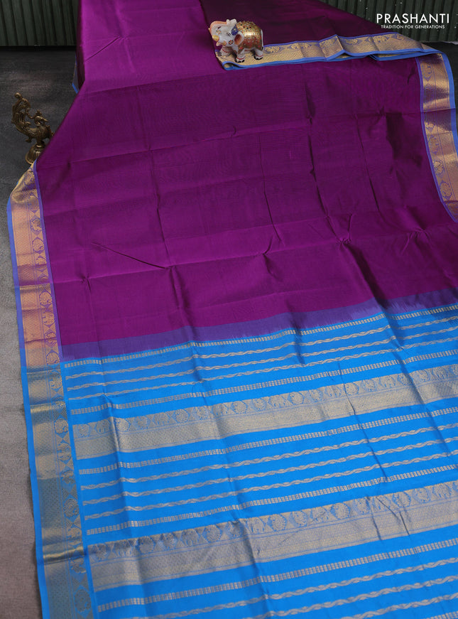 Silk cotton saree purple and cs blue with plain body and zari woven border