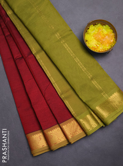 Silk cotton saree maroon and mehendi green with plain body and zari woven border