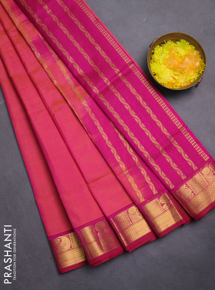 Silk cotton saree dual shade of pinkish orange and pink with plain body and zari woven border