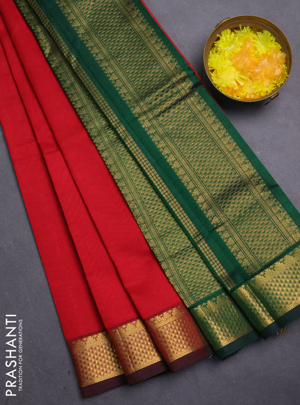 Silk cotton saree red and green with plain body and zari woven border