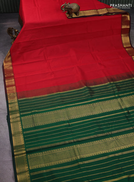 Silk cotton saree red and green with plain body and zari woven border