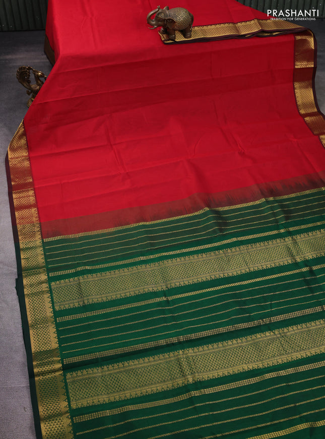 Silk cotton saree red and green with plain body and zari woven border