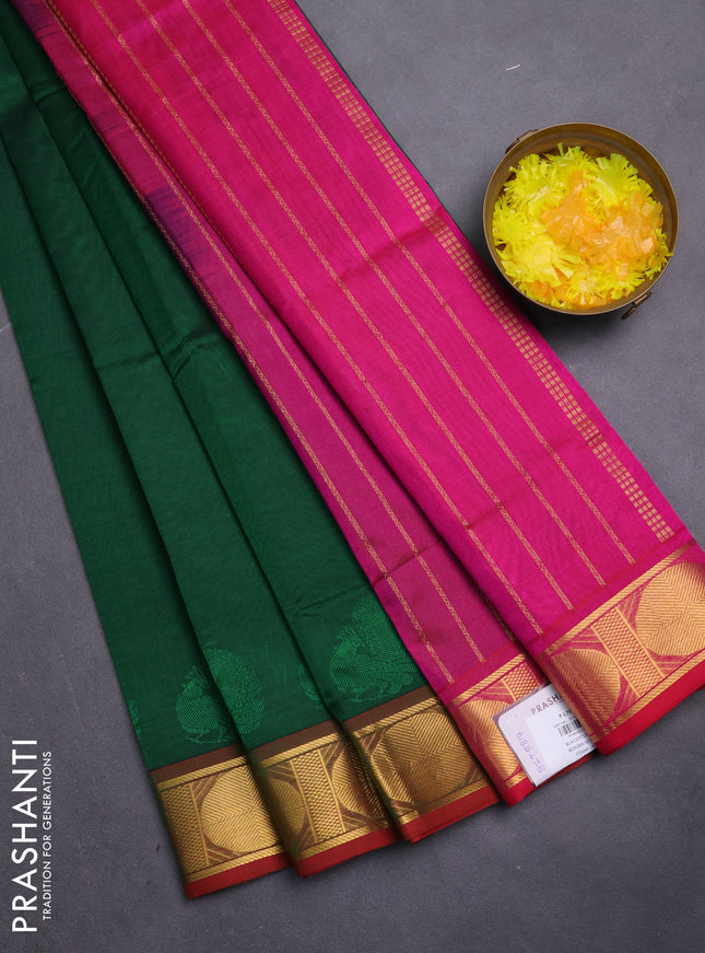 Silk cotton saree green and pink with plain body and zari woven border