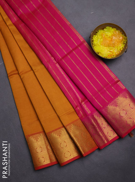 Silk cotton saree mustard yellow and pink with plain body and zari woven border