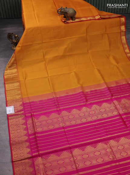 Silk cotton saree mustard yellow and pink with plain body and zari woven border