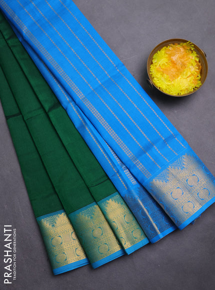 Silk cotton saree green and cs blue with plain body and zari woven border