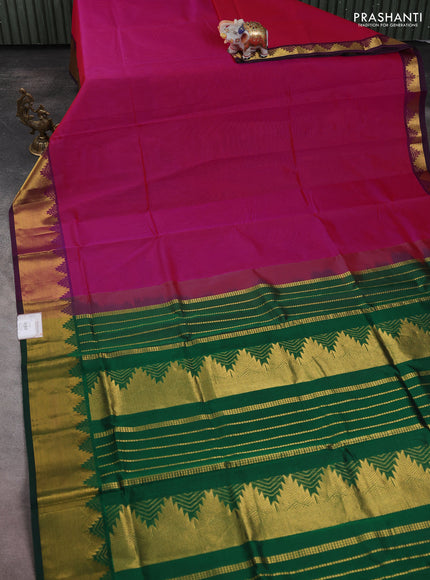 Silk cotton saree pink and green with plain body and zari woven border