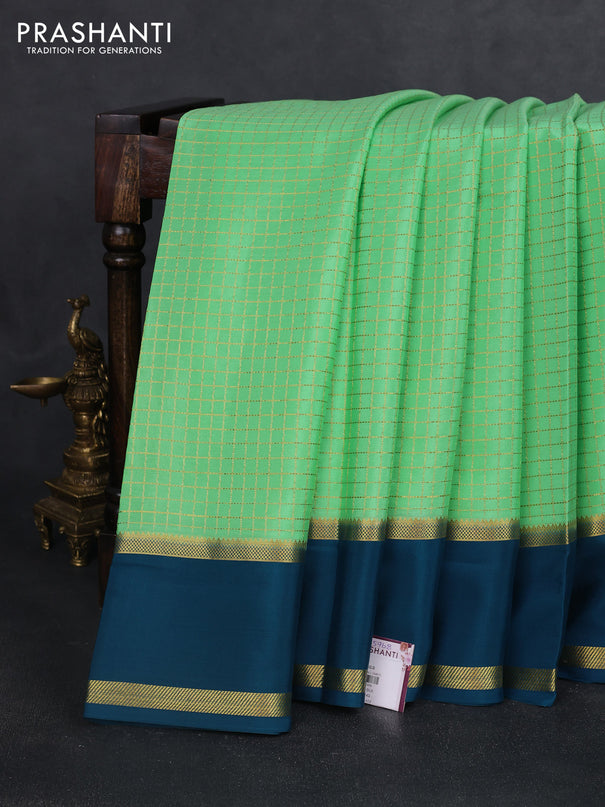 Pure mysore silk saree teal green and peacock green with allover zari checked pattern and rettapet zari woven border