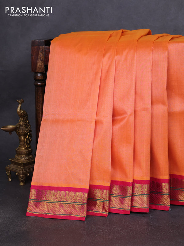 Silk cotton saree orange and pink with plain body and zari woven korvai border