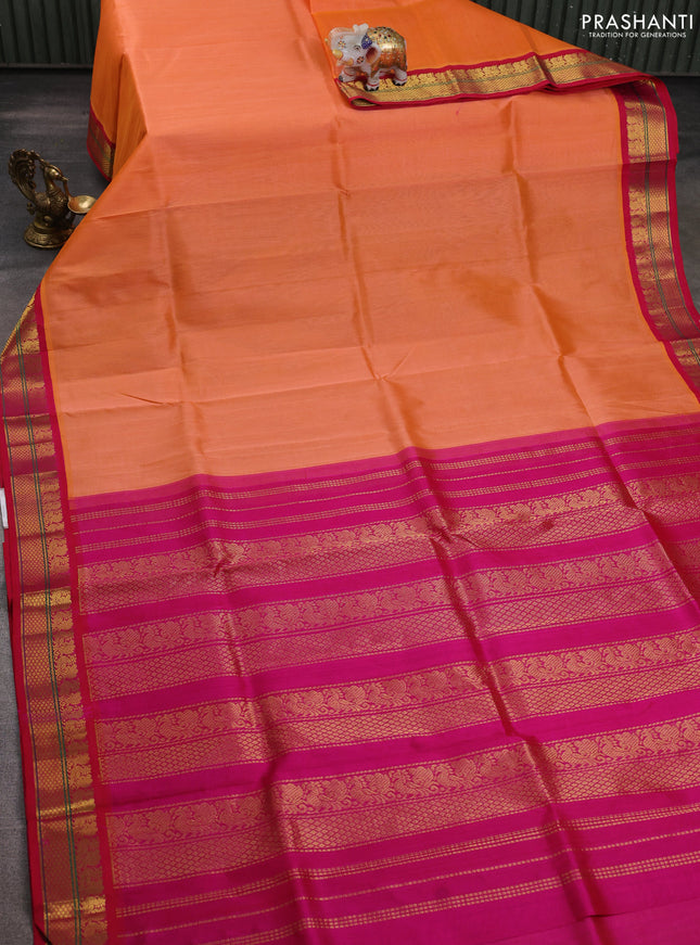Silk cotton saree orange and pink with plain body and zari woven korvai border