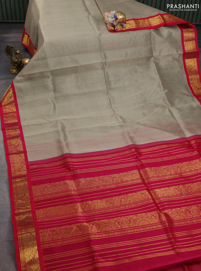 Silk cotton saree beige and pink with plain body and zari woven korvai border