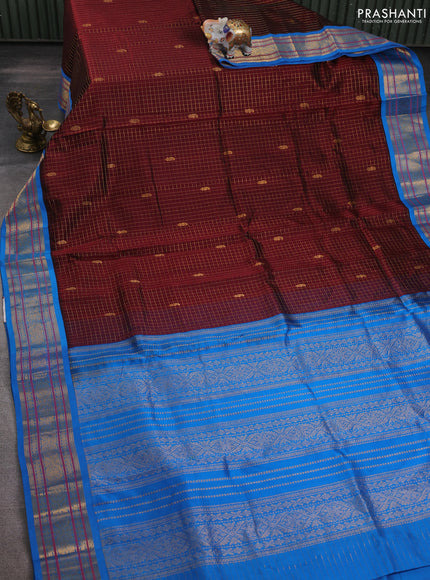 Silk cotton saree maroon and blue with allover zari checks & buttas and zari woven korvai border