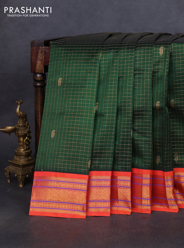 Silk cotton saree dark green and dual shade of pinkish orange with allover zari checks & buttas and zari woven korvai border