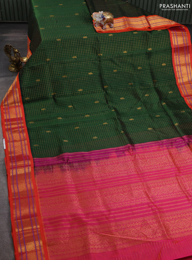 Silk cotton saree dark green and dual shade of pinkish orange with allover zari checks & buttas and zari woven korvai border