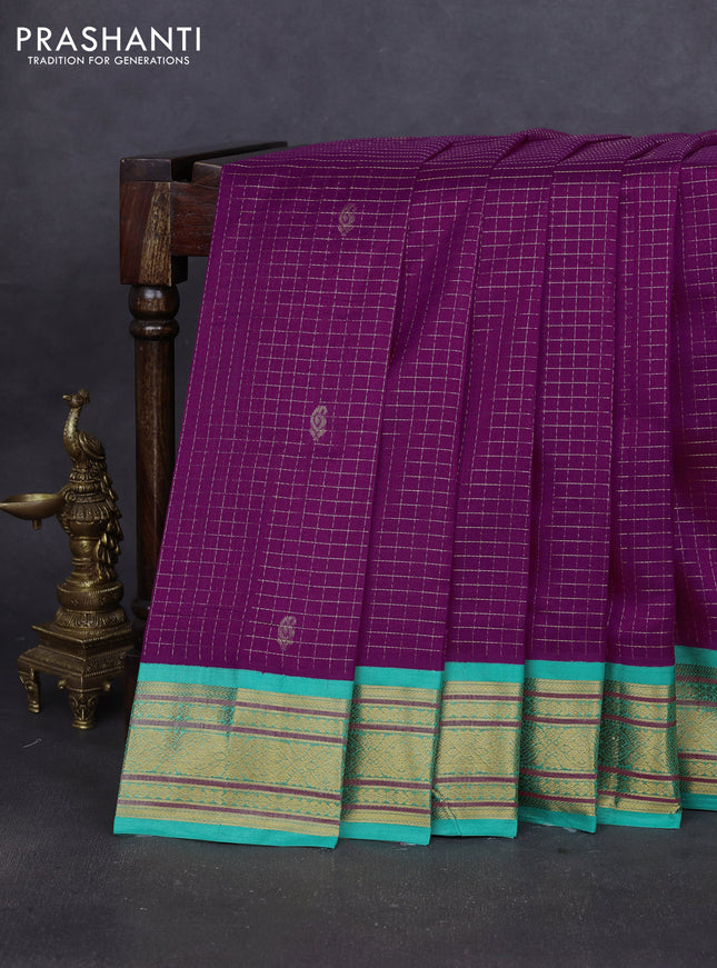 Silk cotton saree purple and teal green with allover zari checks & buttas and zari woven korvai border