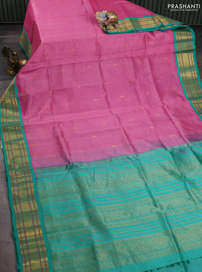 Silk cotton saree light pink and teal green with allover zari checks & buttas and zari woven korvai border