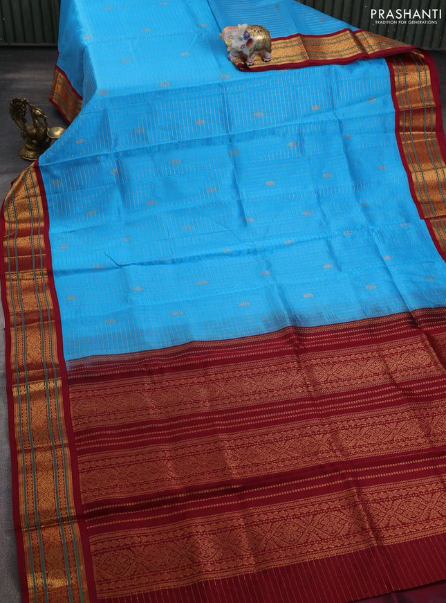 Silk cotton saree cs blue and maroon with allover zari checks & buttas and zari woven korvai border
