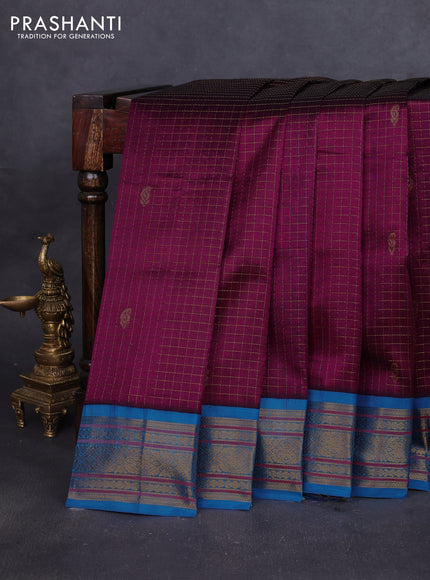 Silk cotton saree purple and cs blue with allover zari checks & buttas and zari woven korvai border