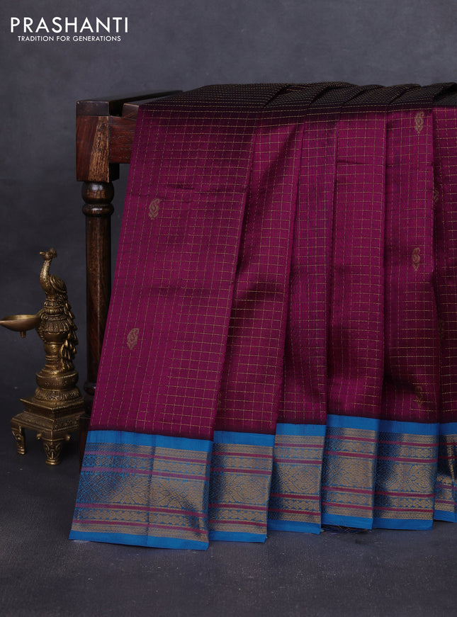 Silk cotton saree purple and cs blue with allover zari checks & buttas and zari woven korvai border