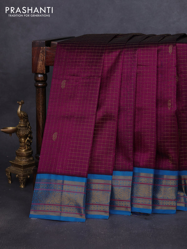 Silk cotton saree purple and cs blue with allover zari checks & buttas and zari woven korvai border