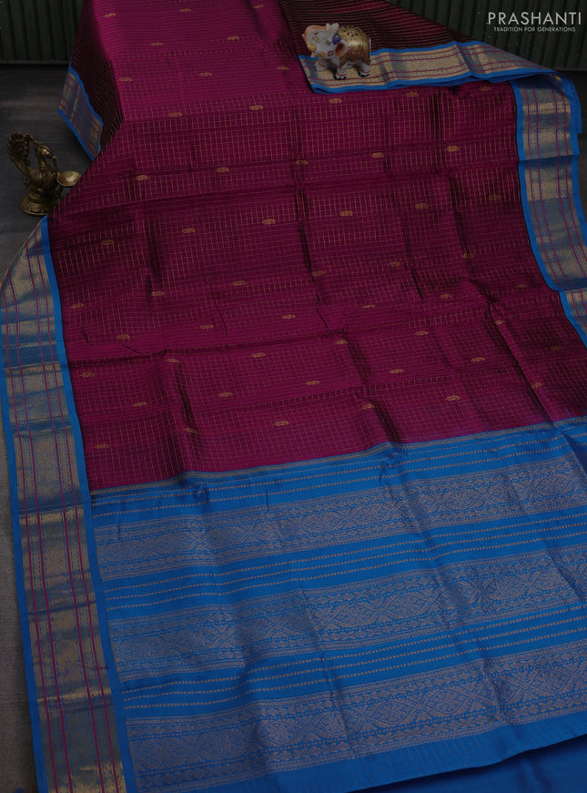 Silk cotton saree purple and cs blue with allover zari checks & buttas and zari woven korvai border