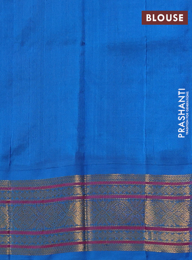 Silk cotton saree purple and cs blue with allover zari checks & buttas and zari woven korvai border