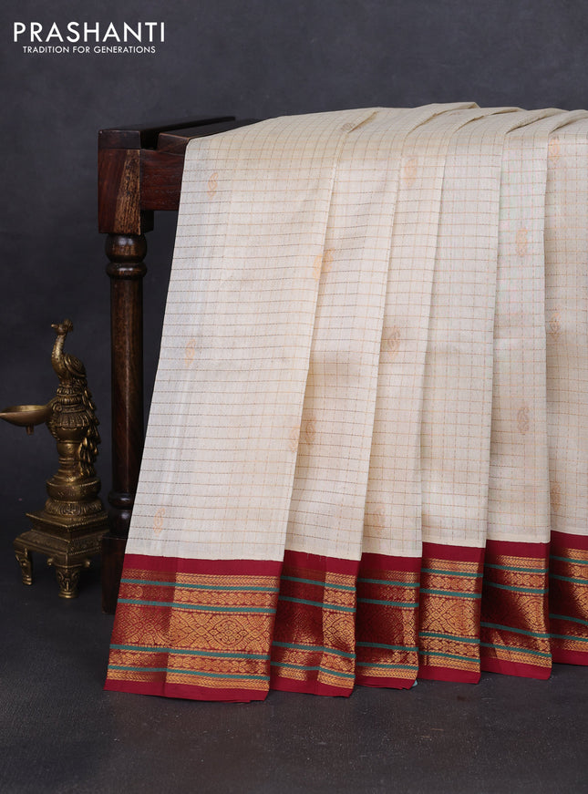 Silk cotton saree cream and maroon with allover zari checks & buttas and zari woven korvai border