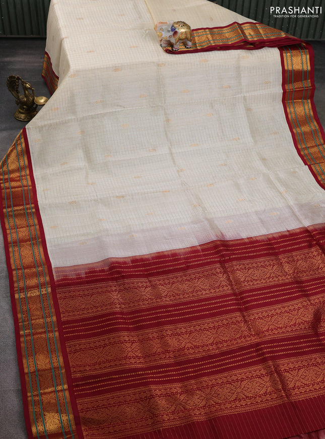 Silk cotton saree cream and maroon with allover zari checks & buttas and zari woven korvai border
