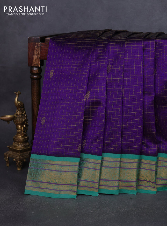Silk cotton saree violet and teal green with allover zari checks & buttas and zari woven korvai border