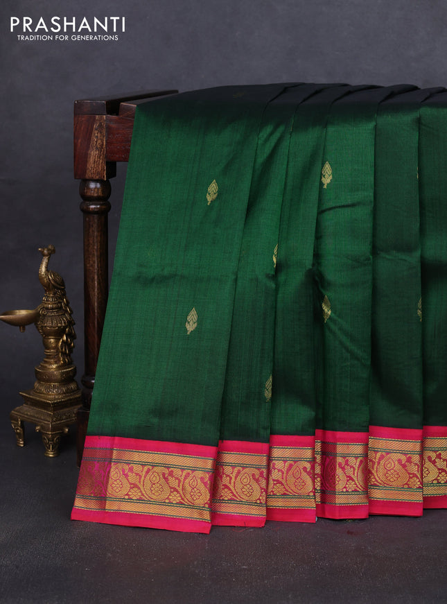 Silk cotton saree bottle green and pink with zari woven buttas and zari woven korvai border