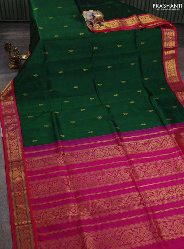 Silk cotton saree bottle green and pink with zari woven buttas and zari woven korvai border