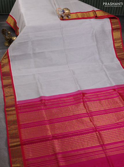 Silk cotton saree off white and pink with plain body and zari woven korvai border