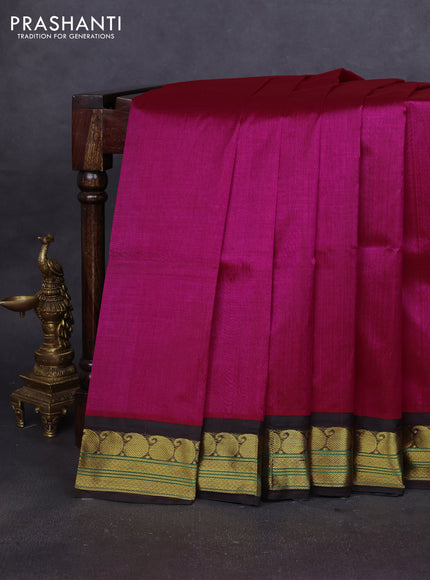 Silk cotton saree rani pink and deep coffee brown with plain body and paisley zari woven korvai border