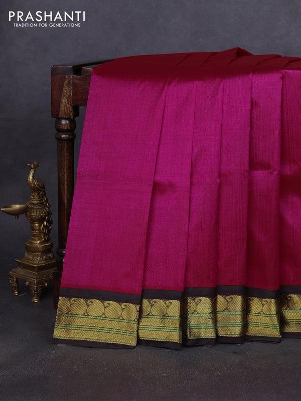 Silk cotton saree rani pink and deep coffee brown with plain body and paisley zari woven korvai border