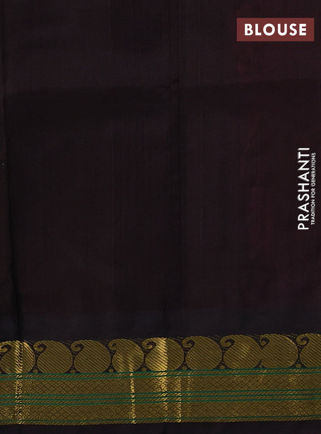 Silk cotton saree rani pink and deep coffee brown with plain body and paisley zari woven korvai border