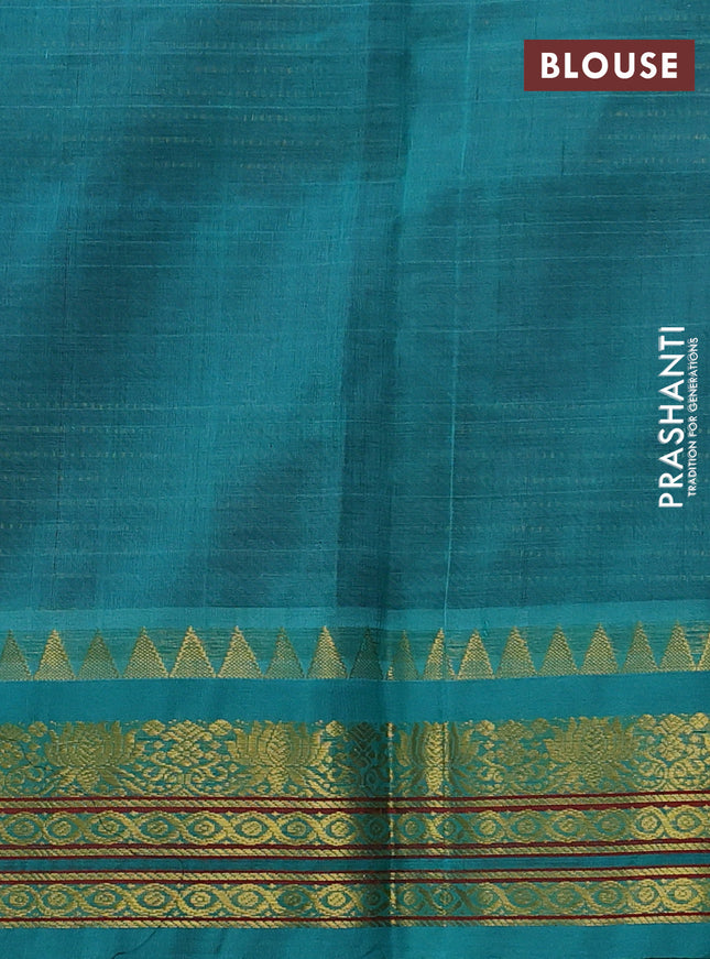 Silk cotton saree purple and teal green shade with allover zari woven checked pattern and temple design zari woven korvai border